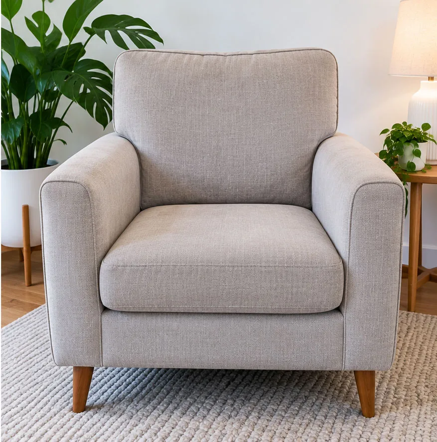Same armchair with even, clean fabric after professional upholstery cleaning