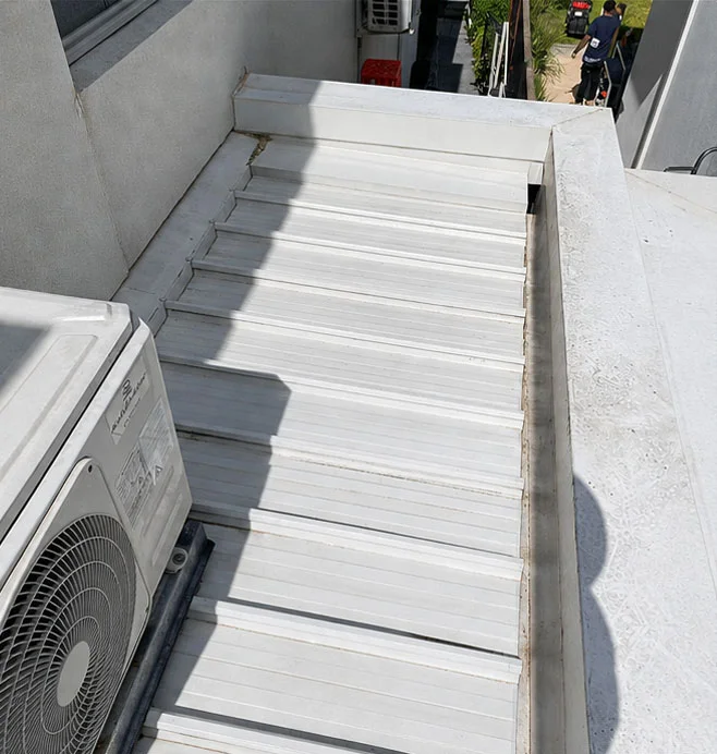 Roof and box gutter cleared of debris and left clean and free-flowing
